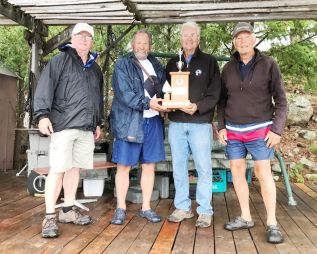 2021 co-winners, Rod Brandon and Rodger Cooper (far left and far right) present the Mazinaw Cup to the 2022 winners, Ab Bertrand and Murray Russell.
